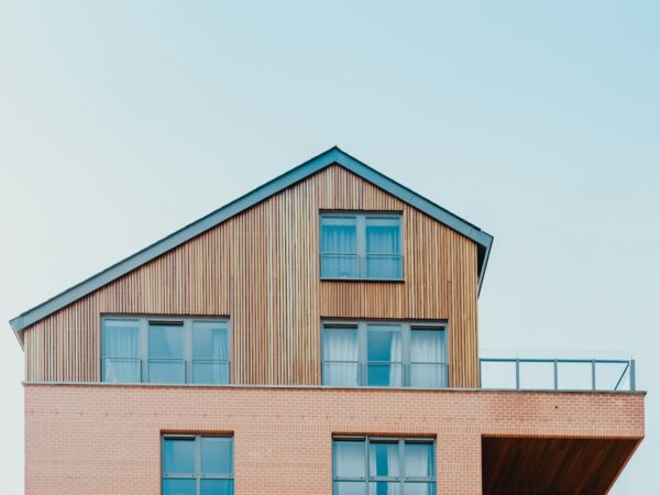 low-angle photo of brown house